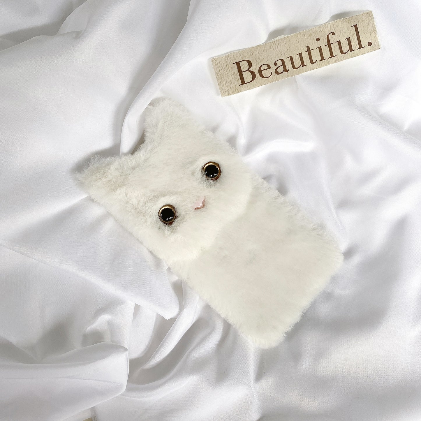 iPhone case,Cute stuffed kitten.